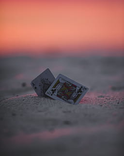 HD wallpaper: Ace of Spade and King of Clubs playing cards on sand, sunset  | Wallpaper Flare