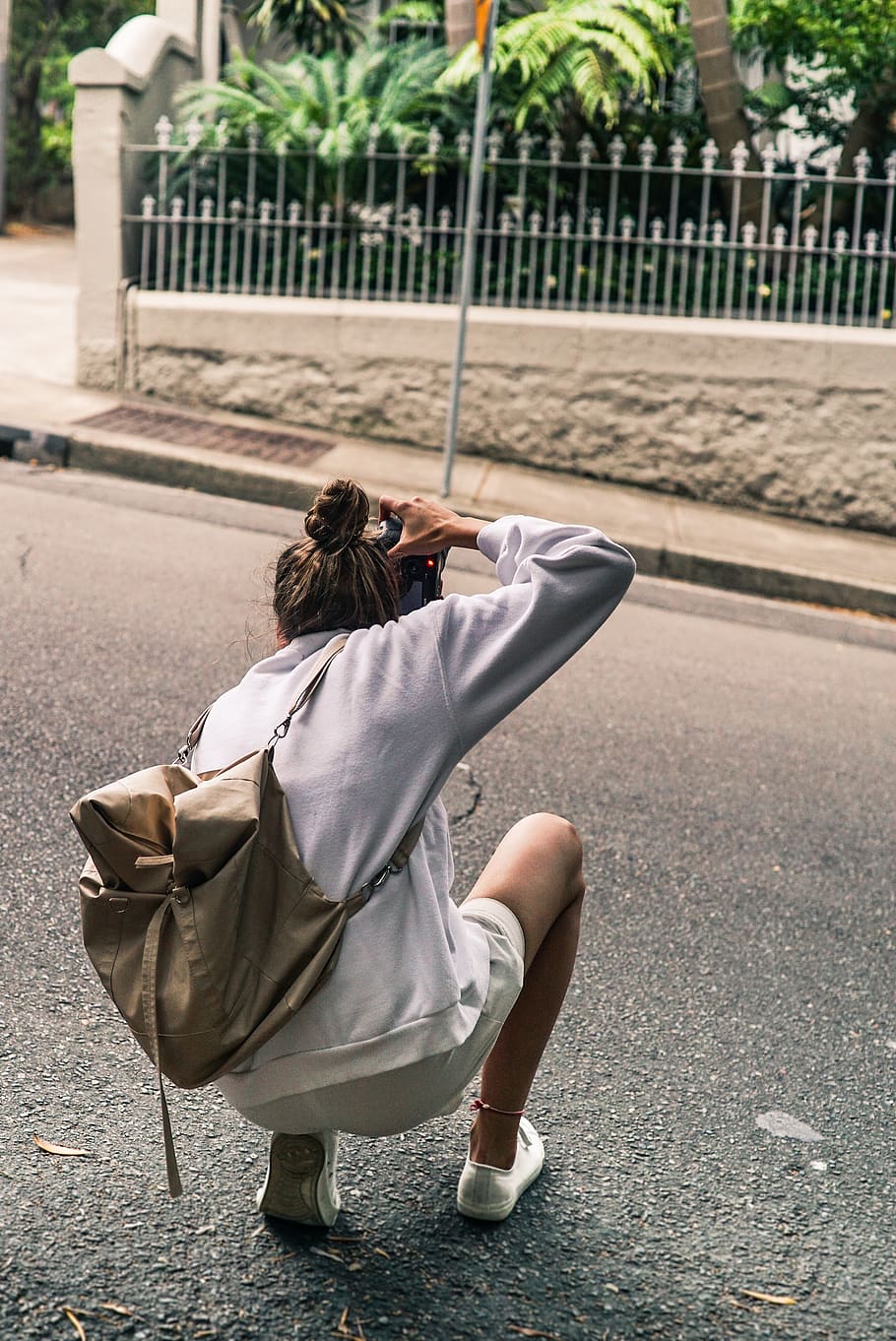 Person Kneeling on Road While Taking Picture, asphalt, camera HD wallpaper