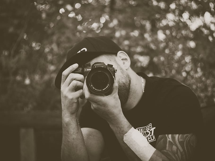 man holding camera, one person, real people, photography themes HD wallpaper