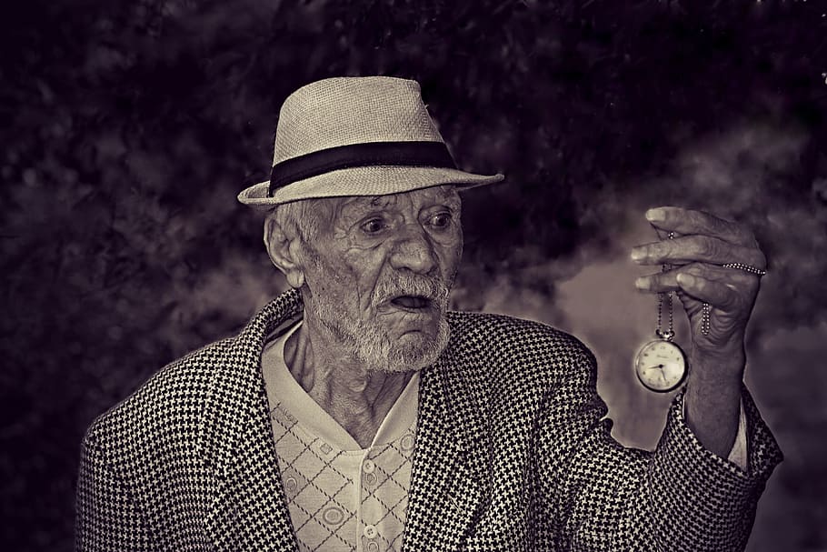 Man Holding Pocket Watch in Grayscale, black-and-white, clock HD wallpaper