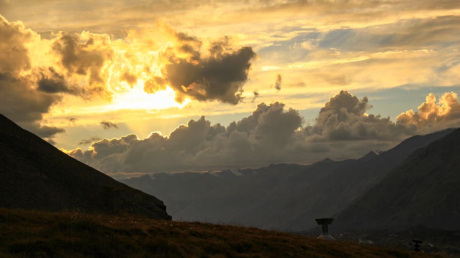 kyrgyzstan, sun, sunset, clouds, yellow, orange, nature, mountains HD wallpaper
