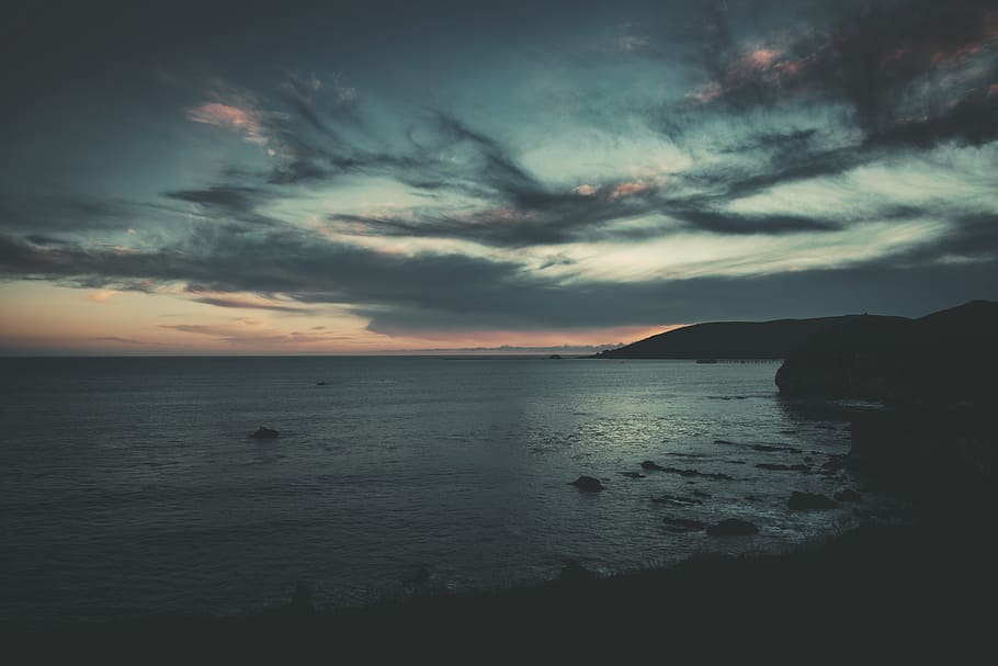 mountains towards shoreline, sky, cloud - sky, water, sea, scenics - nature HD wallpaper