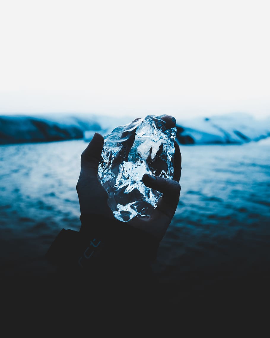 person holding ice, cold, bokeh, depth, blue, sharp, hand, iceland HD wallpaper