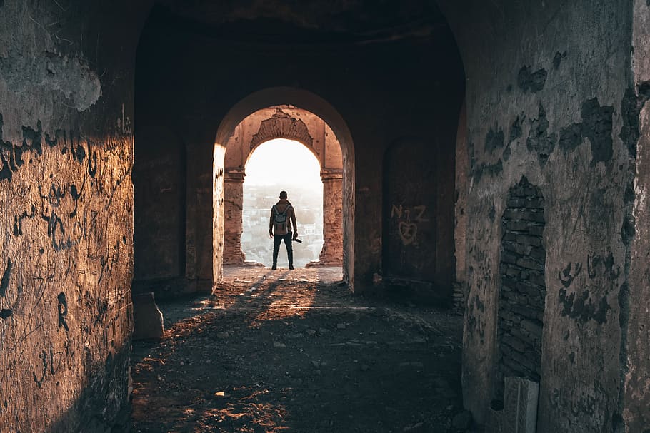 Man Standing On Arc Doorway, abandoned, arch, architecture, building HD wallpaper