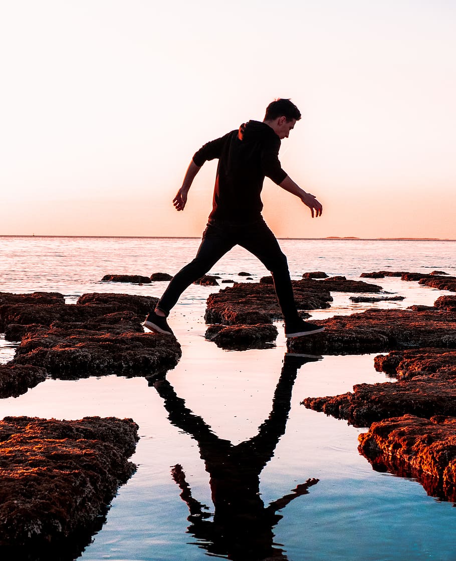 man walking on shore, water, outdoors, standing, human, person HD wallpaper