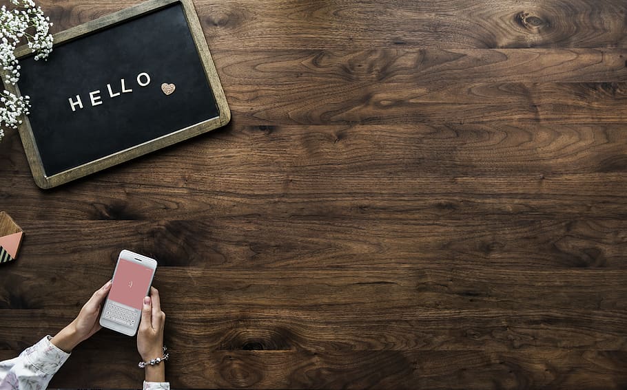 Person Holding Smartphone, blackboard, flatlay, message, wood - material HD wallpaper