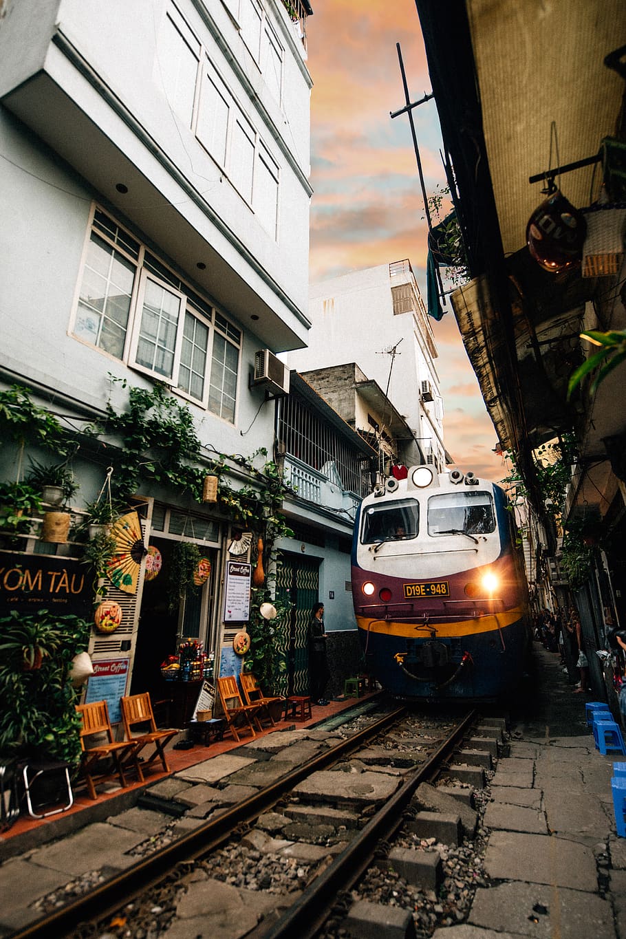 blue train surrounded by houses, architecture, transportation HD wallpaper