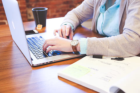 Person Using Macbook on Table, homework, learning, macbook pro HD wallpaper