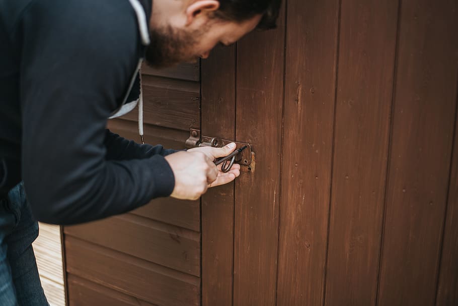 Man in Black Pullover Jacket Picking Lock, adult, door, fixing, HD wallpaper