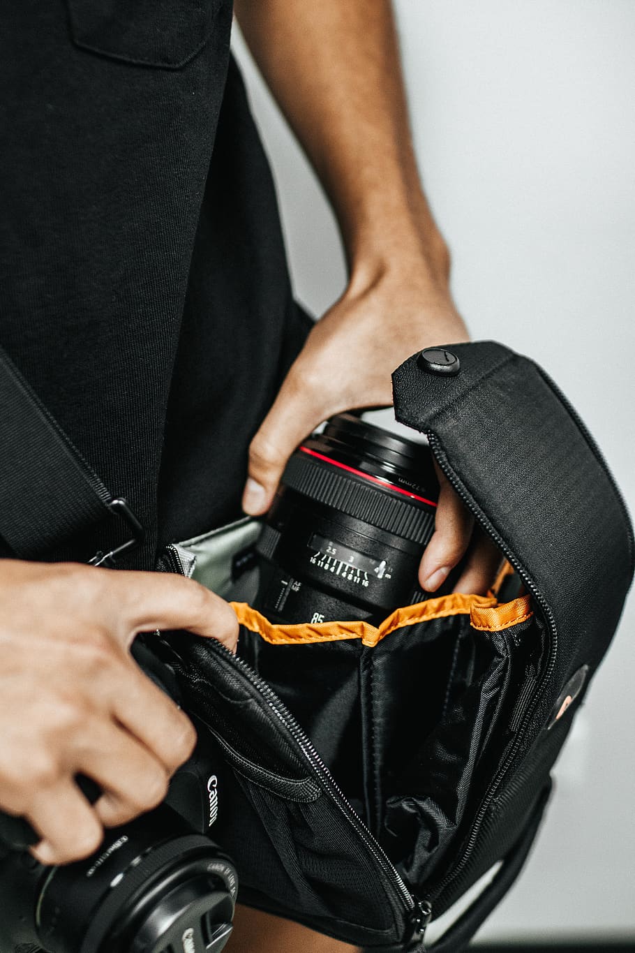 black DSLR camera, human, person, electronics, camera lens, finger HD wallpaper