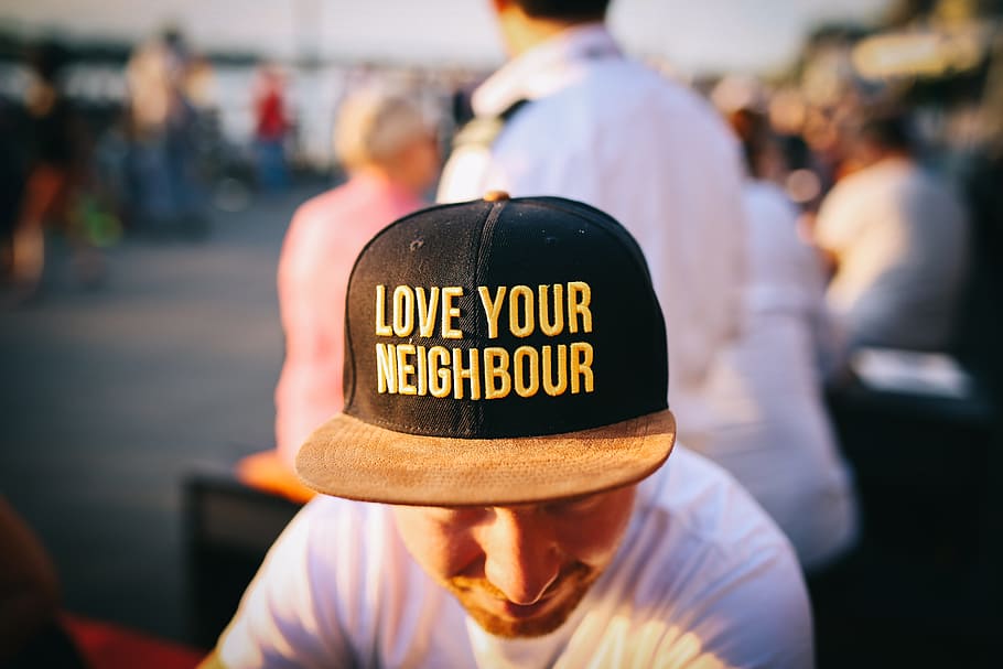 people, men, cap, hat, sunny, outdoor, blur, clothing, text HD wallpaper