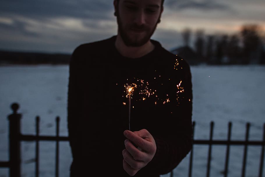 Person Holding Firecracker, blur, blurred background, clouds HD wallpaper