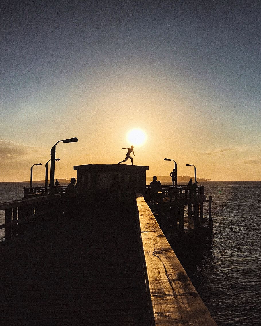 uruguay, punta del este, sunset, action, beach, jump, pier, HD wallpaper