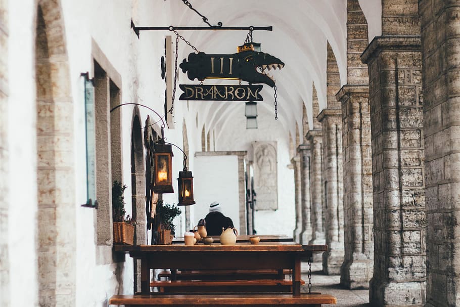 Person Praying Inside Chapel, arches, architecture, benches, building HD wallpaper