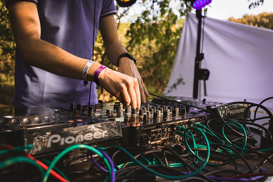 DJ playing on stage, one person, midsection, real people, technology HD wallpaper