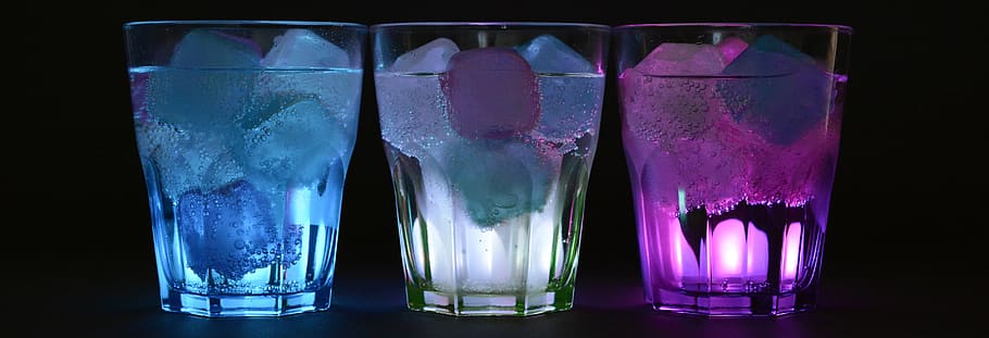 Blue White and Purple Beverage With Ice on Clear Drinking Glass