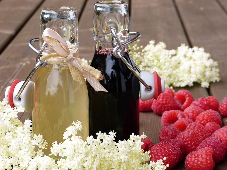 Raspberries, blur, close-up, containers, flowers, focus, fruits HD wallpaper