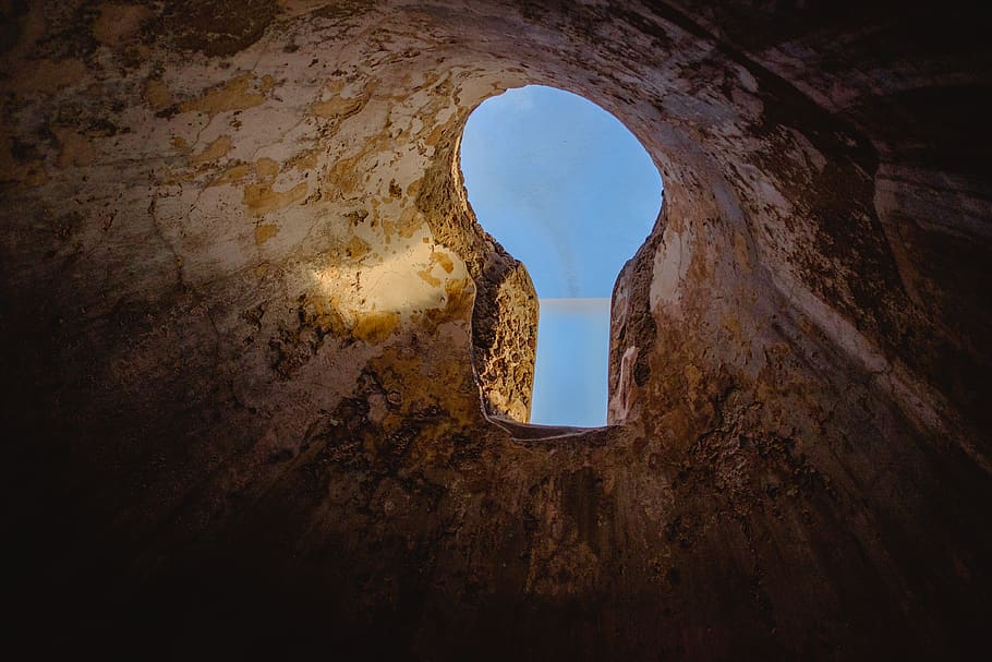 Cave With Hole at the Top Photo, blue sky, dark, daytime, empty HD wallpaper