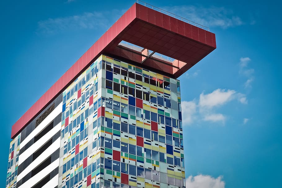 Multicolored Concrete Building Under White Cloudy Sky, architecture HD wallpaper