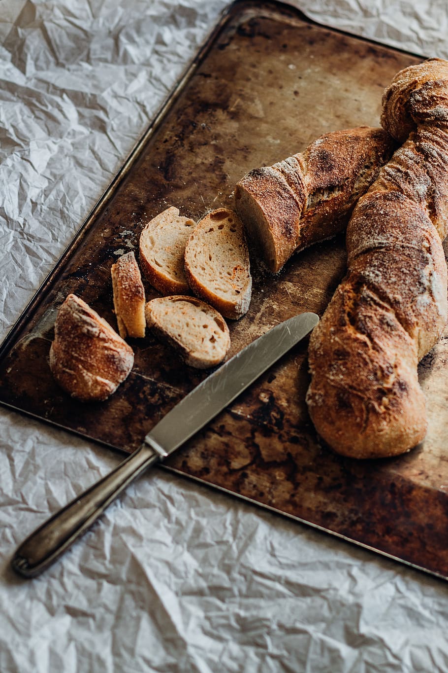 Stainless Steel Bread With Slices of Bread on Chopping Board HD wallpaper
