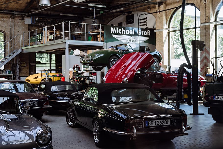 assorted-color vehicles inside building, mode of transportation HD wallpaper