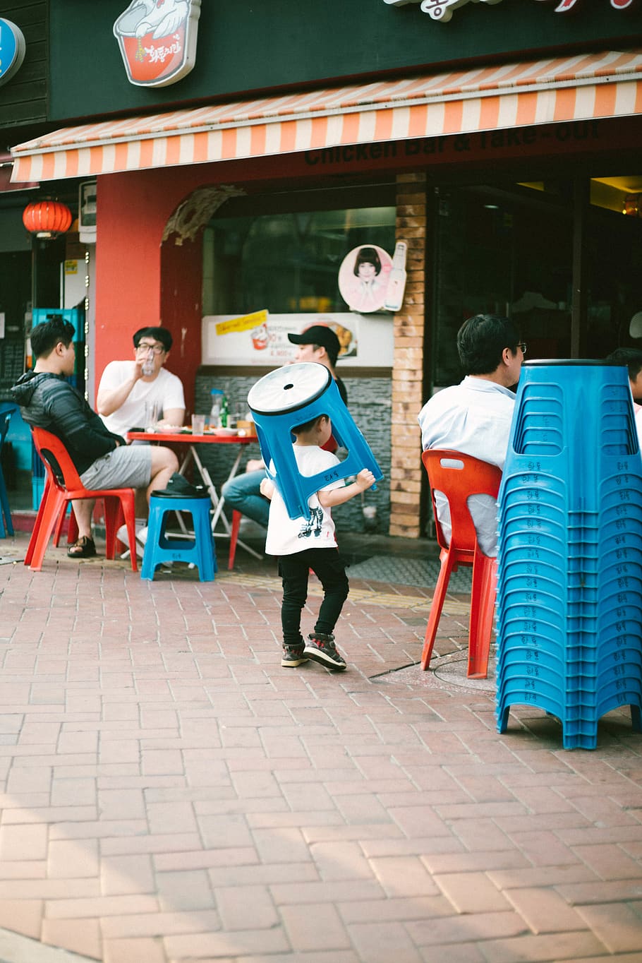 boy holding blue plastic stool, restaurant, clothing, apparel HD wallpaper