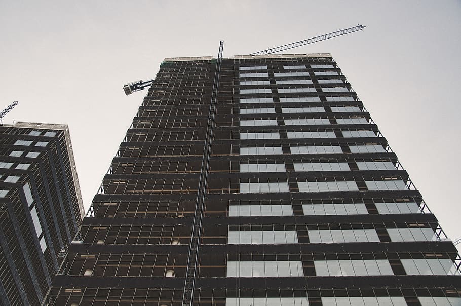 tall building, low angle, architecture, developing, clear sky HD wallpaper