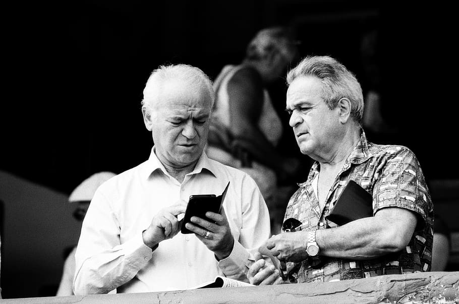 man using smartphone beside the man wearing analog watch, human, HD wallpaper