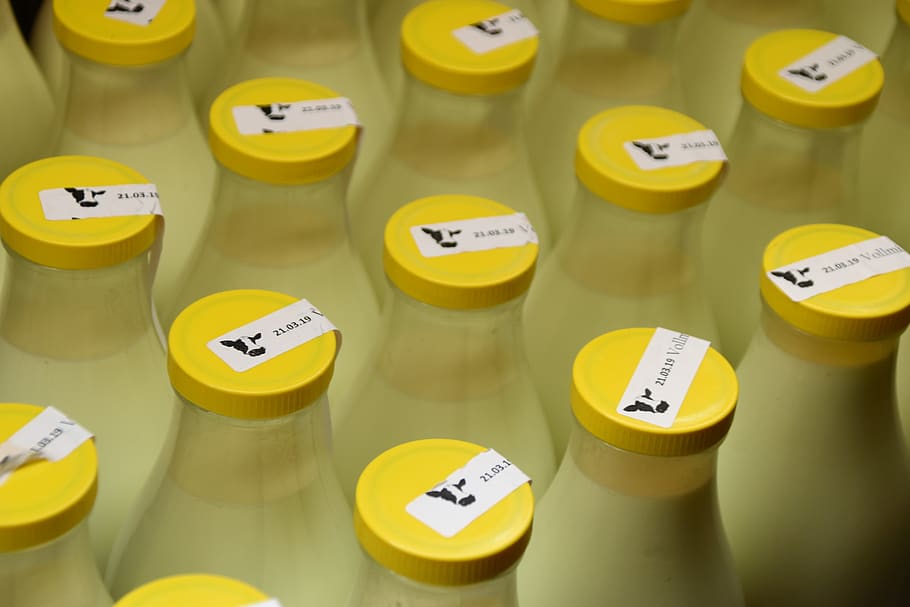 yellow bottle lot, no people, communication, medicine, text, indoors HD wallpaper