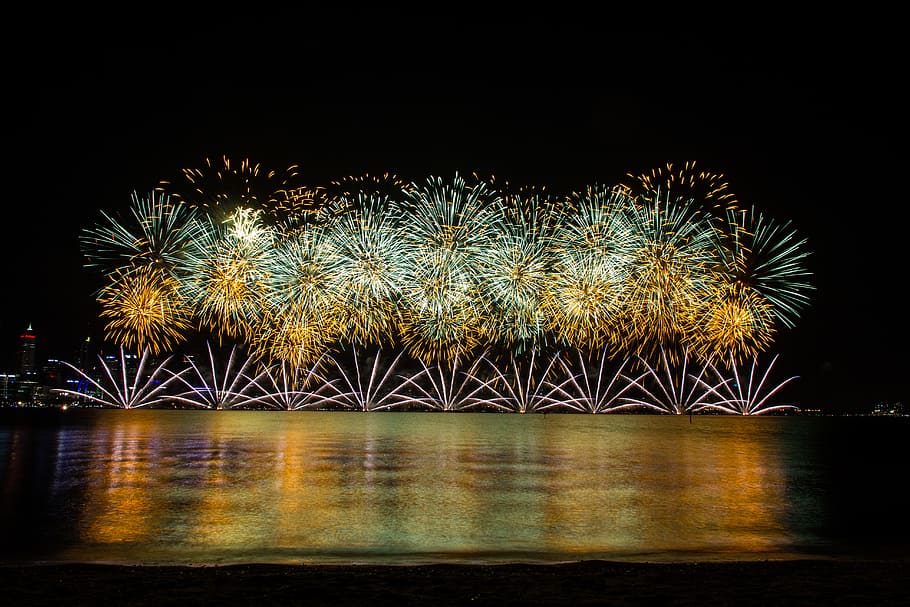 time lapse photography of fireworks, show, explosion, reflection