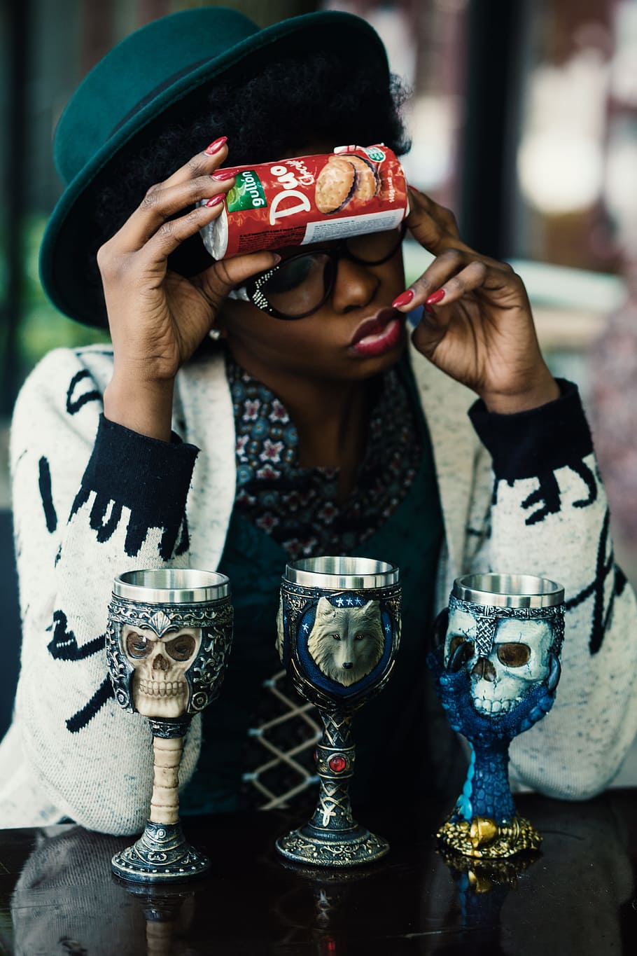 Woman Holding Biscuit Pack, can, cups, goblets, hands, skulls HD wallpaper