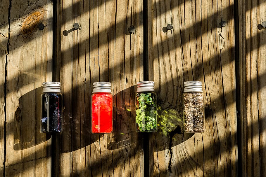 Several Assorted-color Glass Bottles on Table, background, colors HD wallpaper