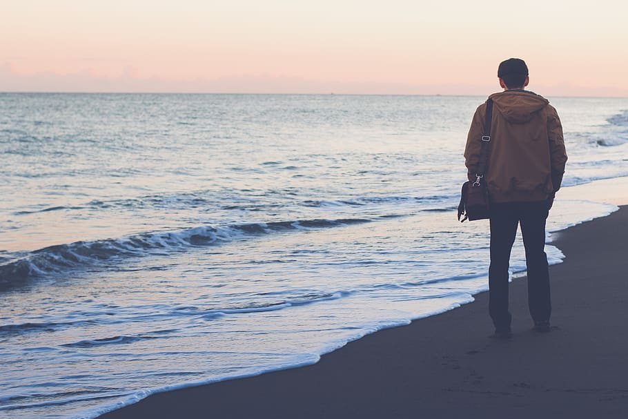 Man Standing on Seashore While Carrying Bag, beach, person, sand, HD wallpaper