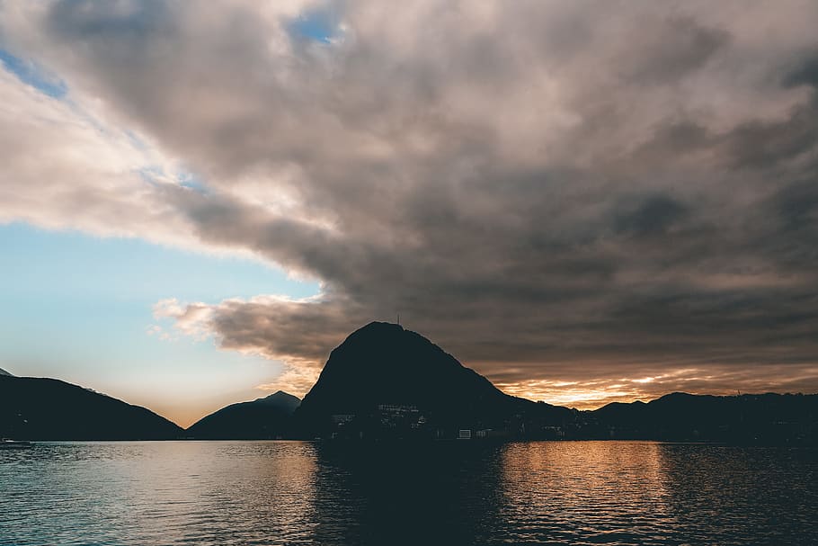 Mountain Under Gray Sky, calm waters, clouds, dawn, daylight HD wallpaper