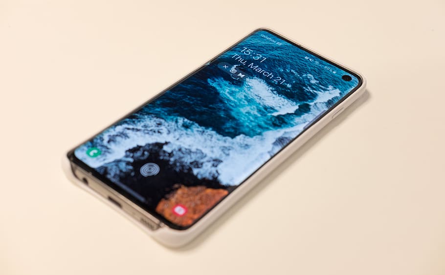 smartphone displaying ocean wave wallpaper, studio shot, wireless technology HD wallpaper