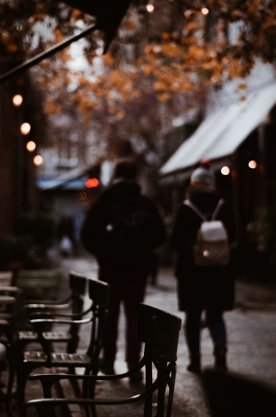 People Walking Near Trees and Houses, back view, blur, chairs HD wallpaper