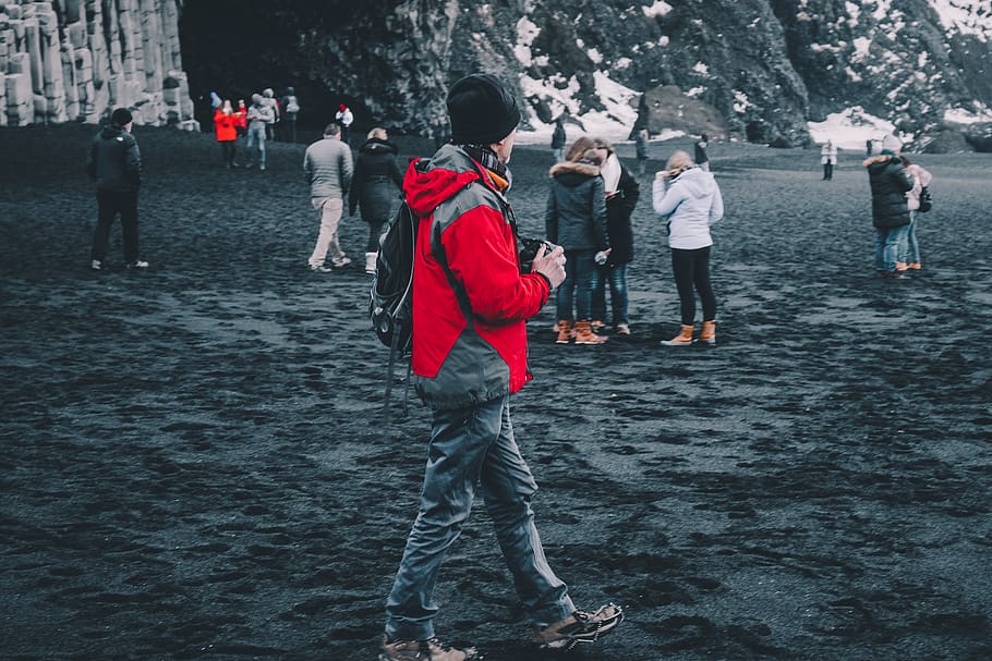 man in red jacket walking in open area, person, human, apparel HD wallpaper