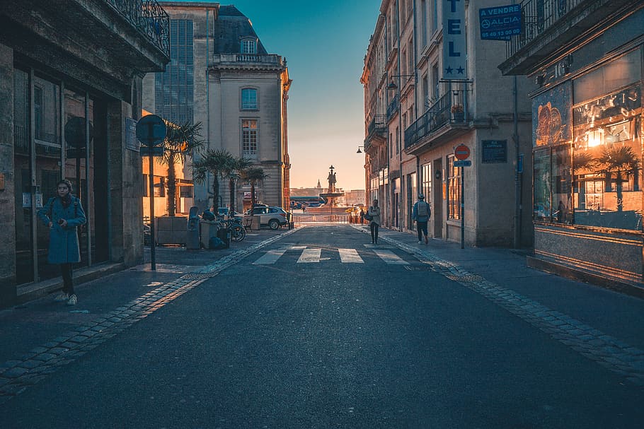 concrete road between building during daytime, tarmac, asphalt HD wallpaper