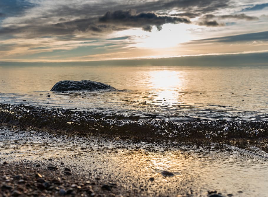 Sunset over the Horizon, beach, boulder, clouds, evening, landscape HD wallpaper
