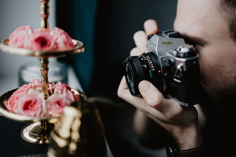 Young man taking photos, working, camera, photography, photographer HD wallpaper