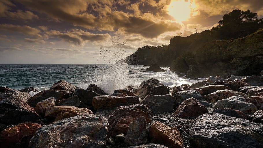 sea, clouds, sky, water, ocean, sunset, wave, stones, vacations HD wallpaper