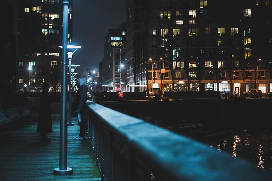 man standing near lamppost, banister, handrail, person, human HD wallpaper