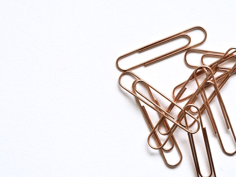 Brass-colored Paper Clips on White Surface, colors, design, flatlay HD wallpaper