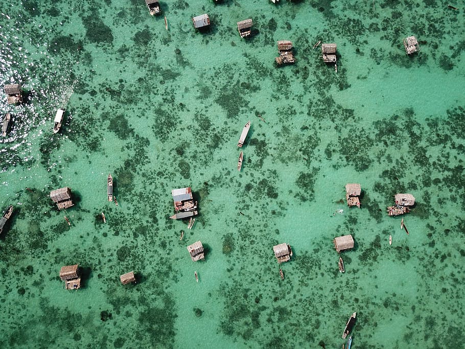 Hd Wallpaper Cottages In Shallow Sea Malaysian Malaysia Person Huts On The Water Wallpaper Flare