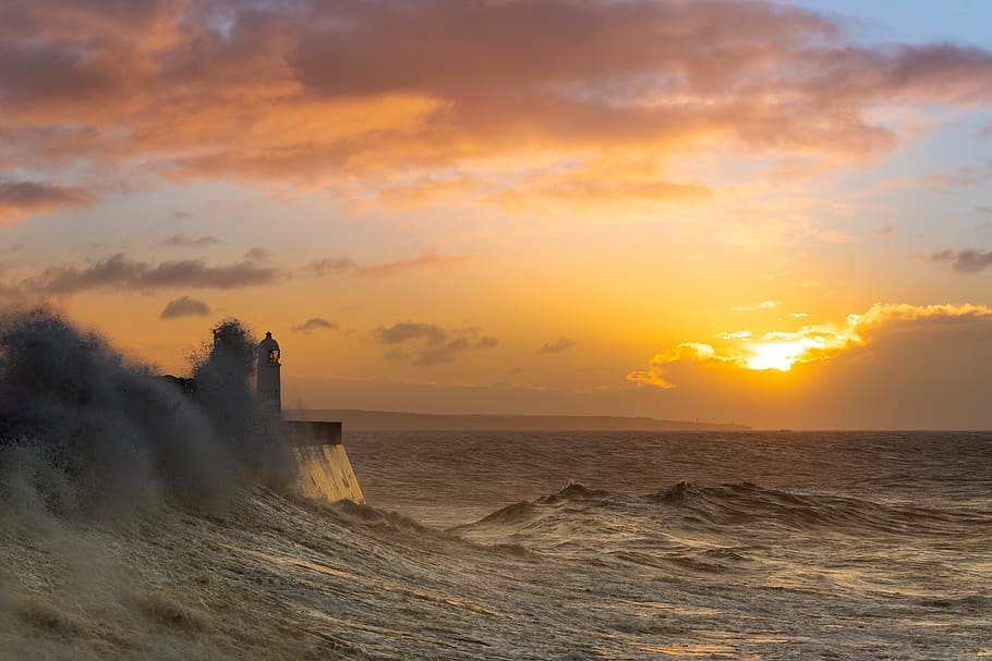 lighthouse beside shore with sunset background, sky, sea, water HD wallpaper