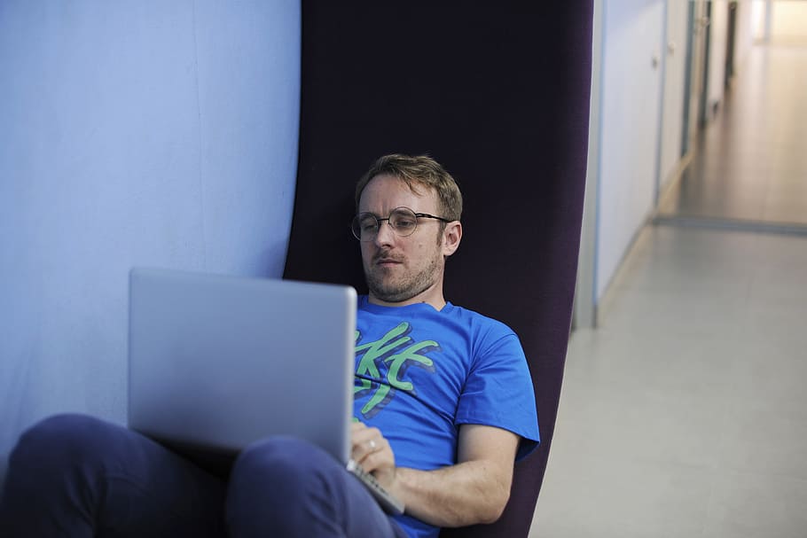 Man Using Laptop While Sitting on Ground, adult, alone, computer HD wallpaper