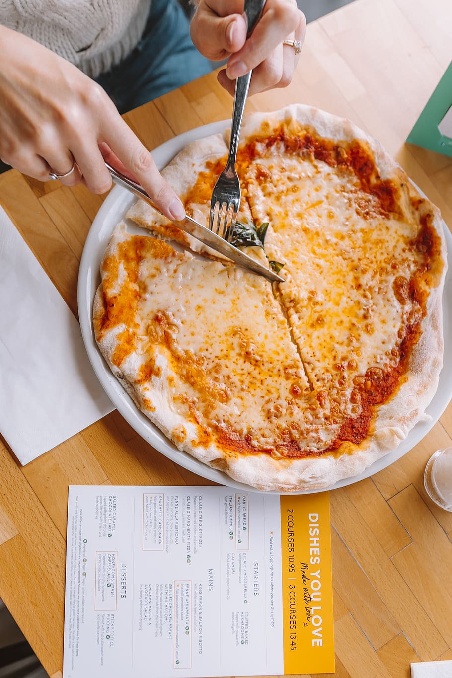 person slicing pizza using knife and fork, food and drink, human hand HD wallpaper