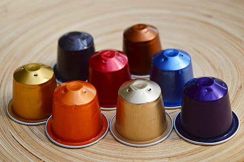 Assorted-color Thimble Lot on Table, blue, brown, coffee, coffee capsule HD wallpaper