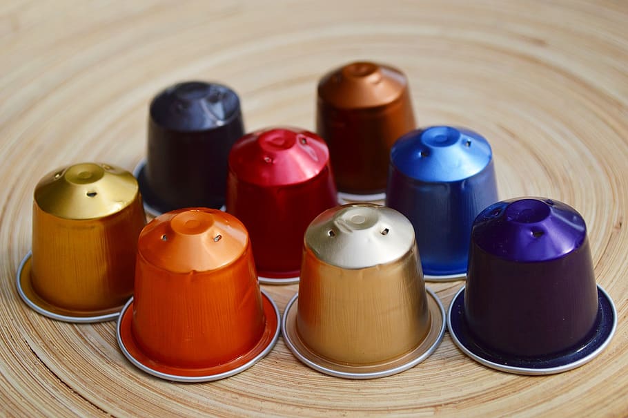 Assorted-color Thimble Lot on Table, blue, brown, coffee, coffee capsule HD wallpaper