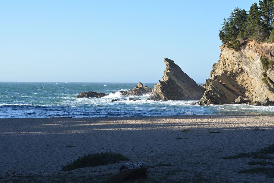 ocean, water, sand, beach, wave, coast, rocks, sea, sky, land HD wallpaper